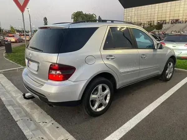 Argintiu Utilizat 2006 Mercedes ML320 SUV | 9.000 EUR - Imagine 1/4
