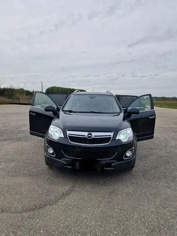 Negru Utilizat 2015 Opel Antara SUV | 5.500 EUR - Imagine 1/4