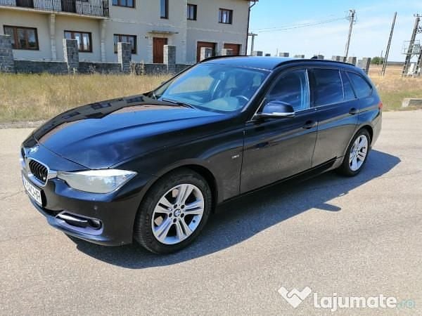 Culoarenegru Utilizat 2014 BMW 320 Sport Line Break | 9.000 EUR (Super Preț) - Imagine 1/4