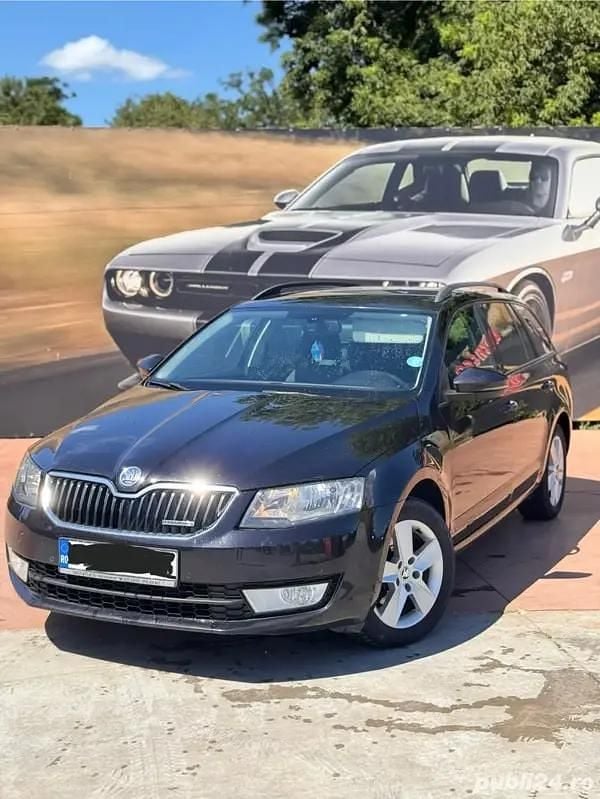 Second-hand 2014 Skoda Octavia GreenLine Break | 7.590 EUR (Puțin scump) - Imagine 1/4