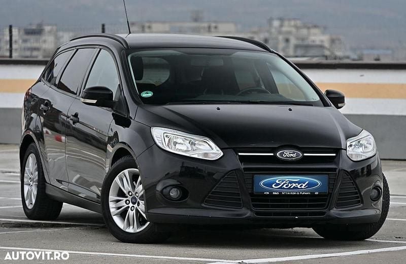 Culoarenegru Utilizat 2011 Ford Focus Titanium Break | 3.999 EUR (Preț OK) - Imagine 1/4