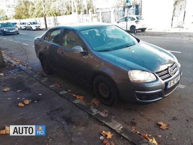 Gri Utilizat 2010 VW Jetta Berlinǎ | 6.200 EUR (Preț OK) - Imagine 1/4
