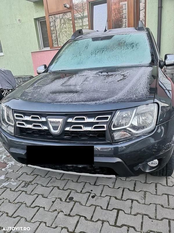 Gri Second-hand 2017 Dacia Duster Comfort SUV | 8.000 EUR (Preț bun) - Imagine 1/4