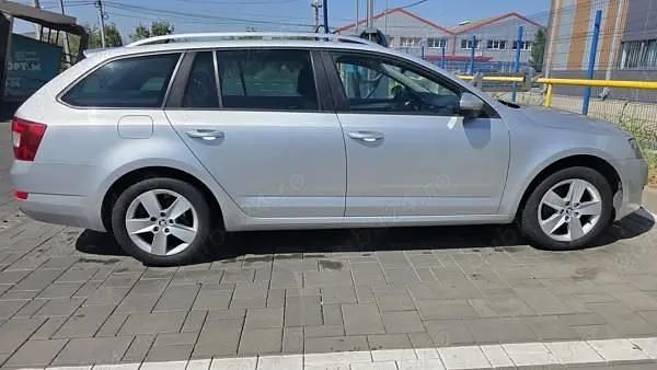 Argintiu Utilizat 2014 Skoda Octavia Elegance Break | 5.900 EUR (Preț bun) - Imagine 1/4