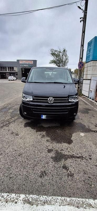 Culoarenegru Utilizat 2015 VW Multivan Monovolum | 20.600 EUR (Super Preț) - Imagine 1/4