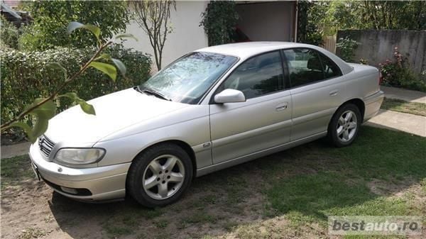 Second-hand Opel Omega 130 CP (95 kW) 2003 Argintiu metalizat Berlinǎ
