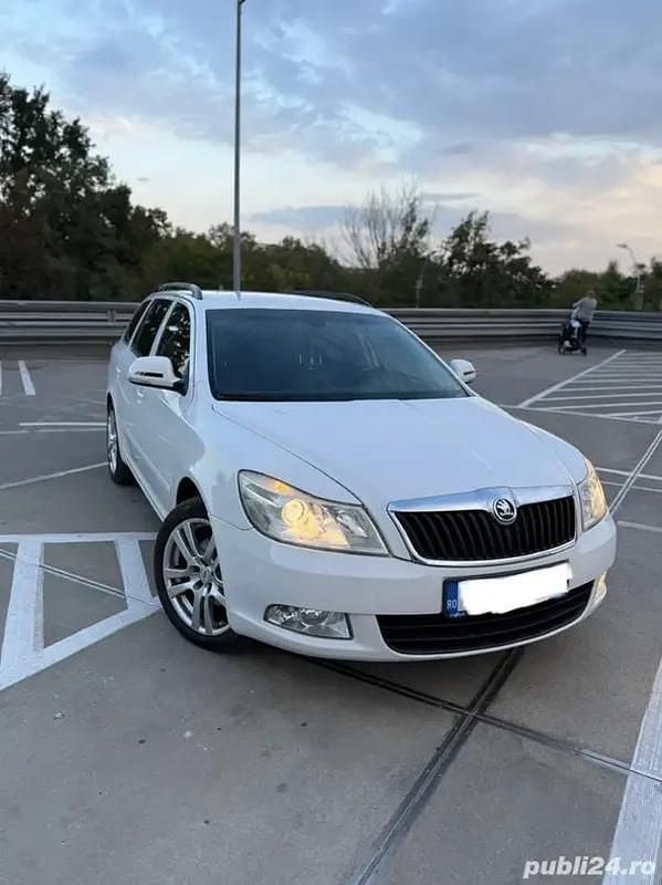Culoarealb Utilizat 2009 Skoda Octavia Ambiente Break | 4.200 EUR (Preț OK) - Imagine 1/4