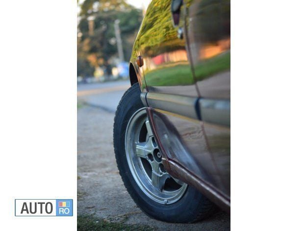 Second-hand Nissan Primera 90 CP (66 kW) 1994 Rosu Berlinǎ