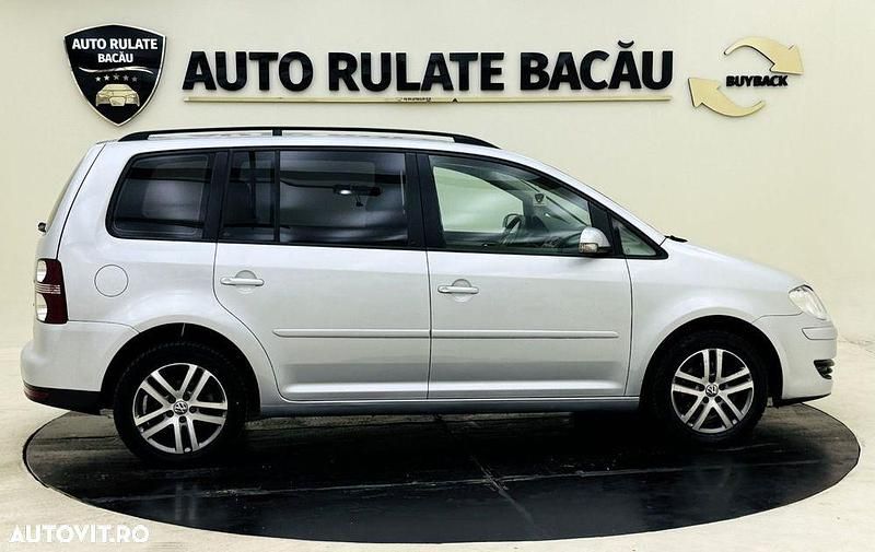 Second-hand VW Touran 105 CP (77 kW) 2008 Culoarenegru Monovolum