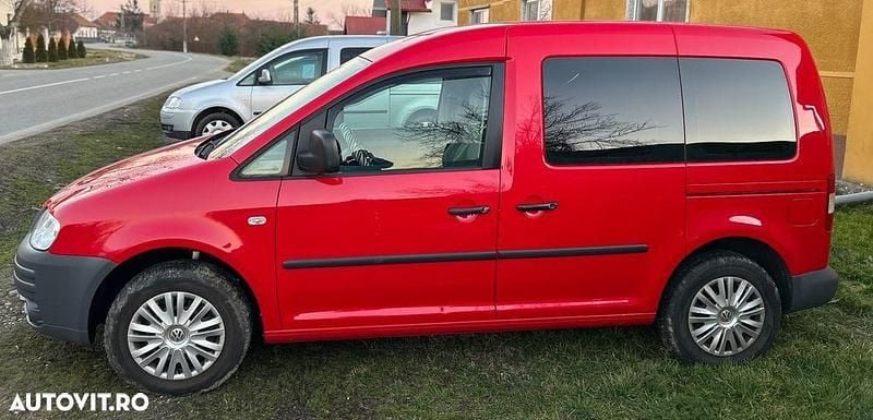 Second-hand VW Caddy Maxi Style 105 CP (77 kW) 2008 Culoarerosu Monovolum