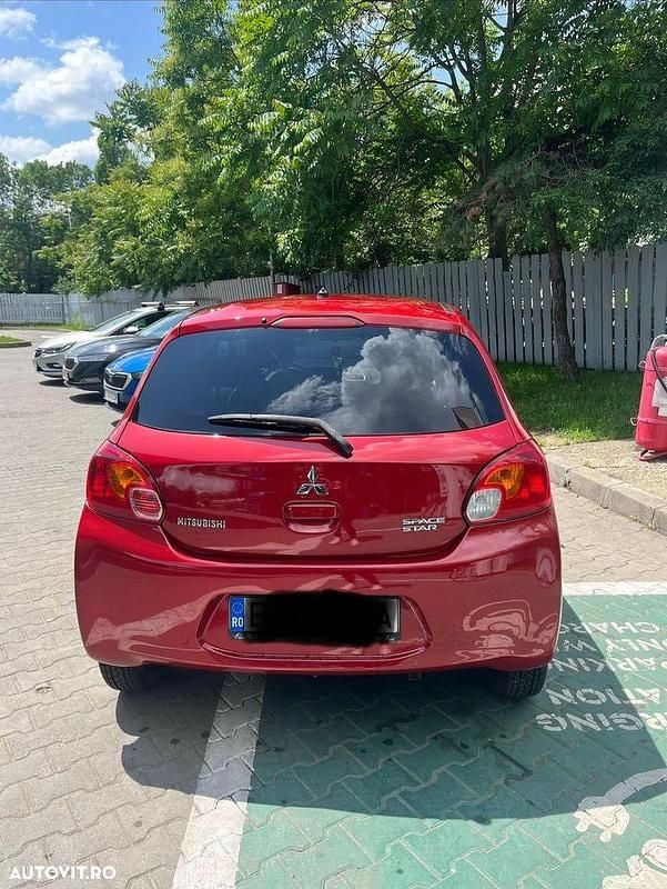 Second-hand Mitsubishi Space Star Intense 80 CP (58 kW) 2015 Culoarerosu Coupe