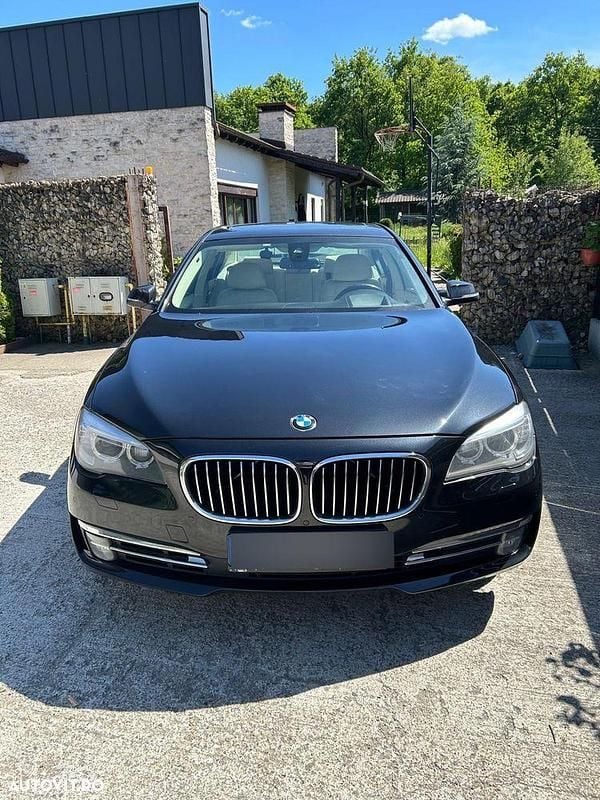 Culoarenegru Utilizat 2014 BMW 740 Comfort Edition Berlinǎ | 15.200 EUR (Preț OK) - Imagine 1/4