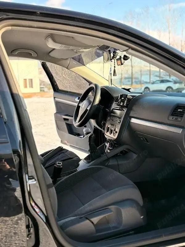 Second-hand VW Jetta 140 CP (102 kW) 2009 Negru Berlinǎ