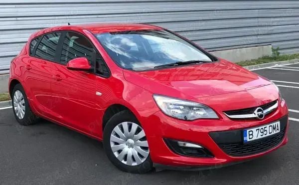 Rosu Utilizat 2014 Opel Astra Hatchback | 5.500 EUR (Preț OK) - Imagine 1/4