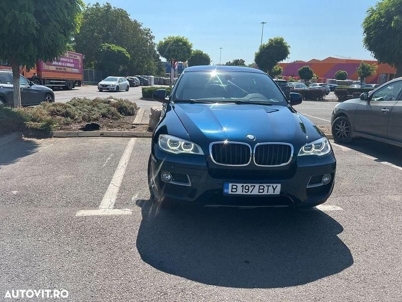 Culoarealbastru Utilizat 2014 BMW X6 SUV | 18.000 EUR (Super Preț) - Imagine 1/4