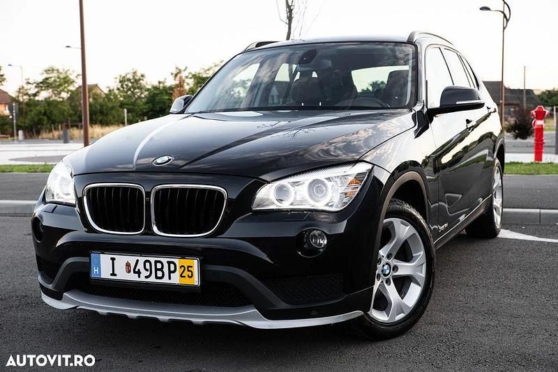 Culoarenegru Utilizat 2014 BMW X1 xLine SUV | 8.999 EUR (Super Preț) - Imagine 1/4