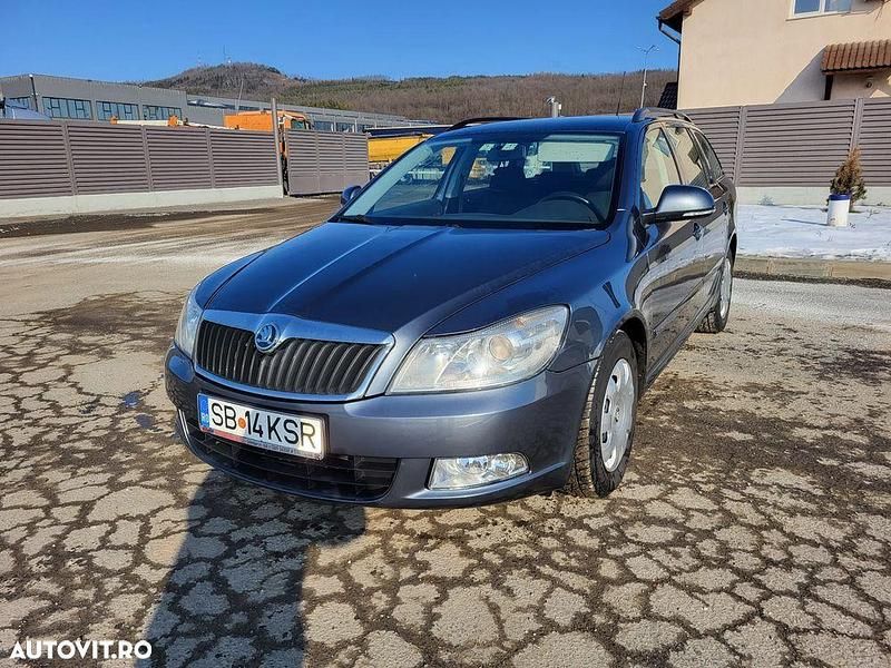 Culoaregri Second-hand 2010 Skoda Octavia Business Line Break | 4.650 EUR (Preț OK) - Imagine 1/4