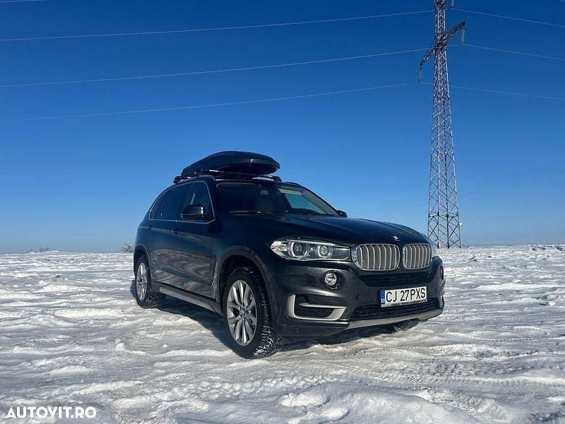 Negru Second-hand 2015 BMW X5 Comfort Edition SUV | 19.990 EUR (Super Preț) - Imagine 1/4
