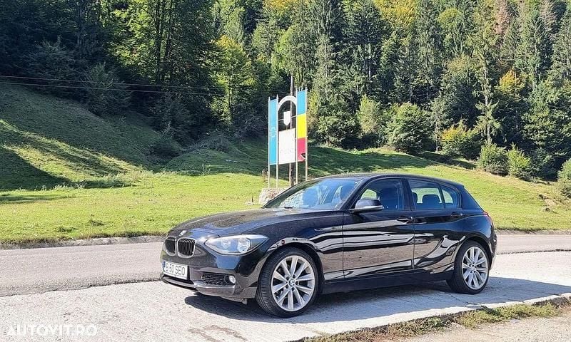 Culoarenegru Utilizat 2014 BMW 116 Comfort Edition Hatchback | 7.500 EUR (Preț OK) - Imagine 1/4
