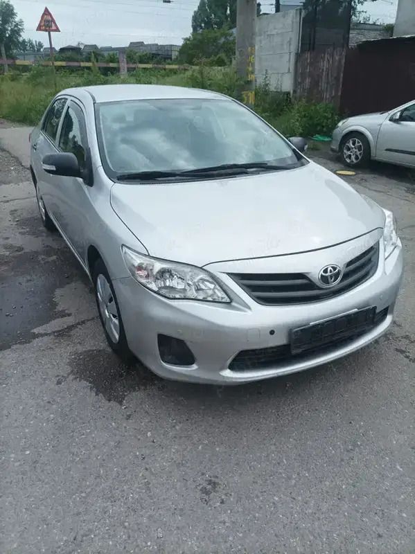 Gri Utilizat 2011 Toyota Corolla Berlinǎ | 4.100 EUR - Imagine 1/4