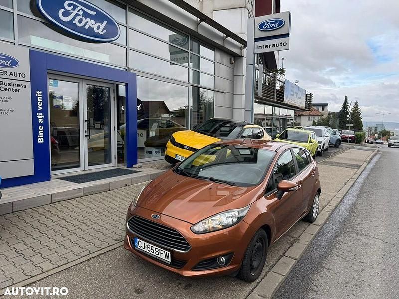 Culoareportocaliu Utilizat 2015 Ford Fiesta Trend Hatchback | 5.790 EUR (Preț OK) - Imagine 1/4