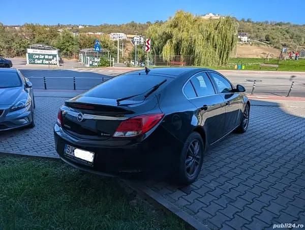 Second-hand Opel Insignia 140 CP (102 kW) 2009 Negru Berlinǎ