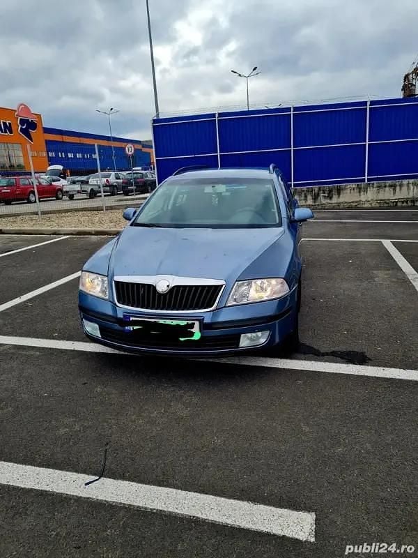 Gri Utilizat 2008 Skoda Octavia Break | 2.990 EUR (Preț OK) - Imagine 1/4