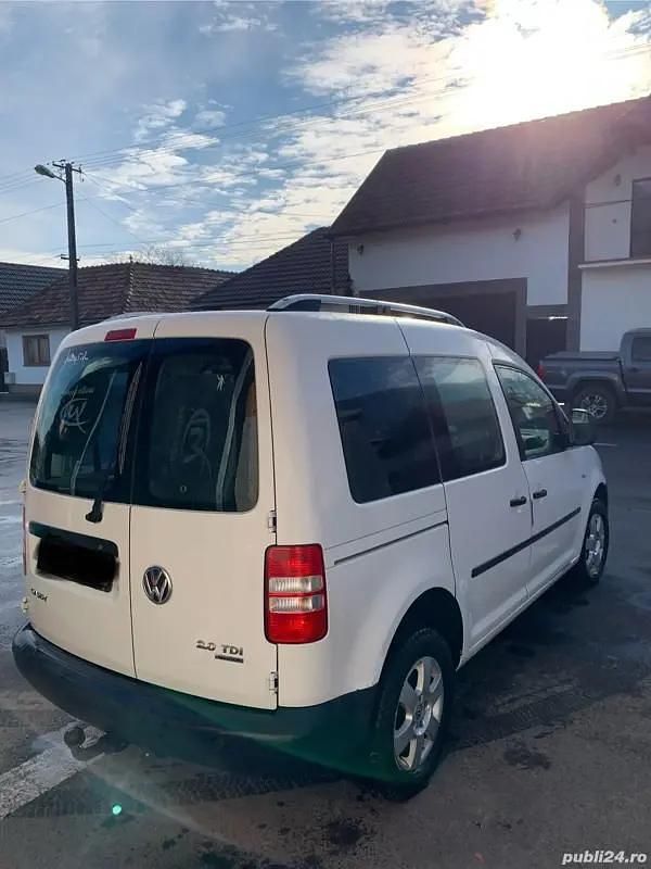 Second-hand VW Caddy 81 CP (59 kW) 2012 Alb Monovolum