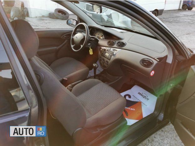 Albastru metalizat Utilizat 2004 Ford Focus Berlinǎ | 1.699 EUR (Preț OK) - Imagine 1/4