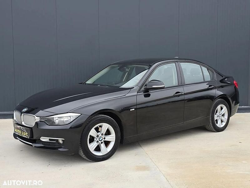 Culoarenegru Second-hand 2013 BMW 318 Comfort Edition Berlinǎ | 7.450 EUR (Super Preț) - Imagine 1/4