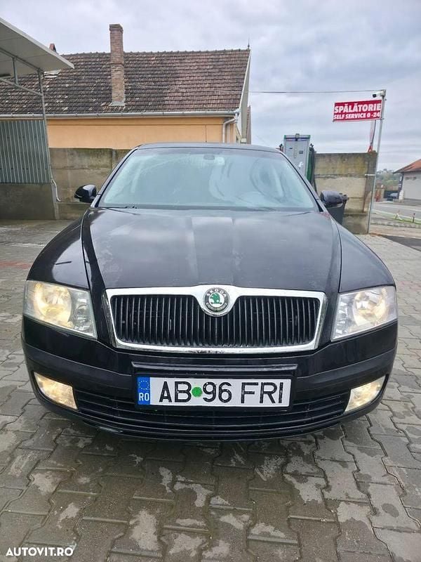 Culoarenegru Utilizat 2005 Skoda Octavia Ambiente Berlinǎ | 2.099 EUR (Preț OK) - Imagine 1/4