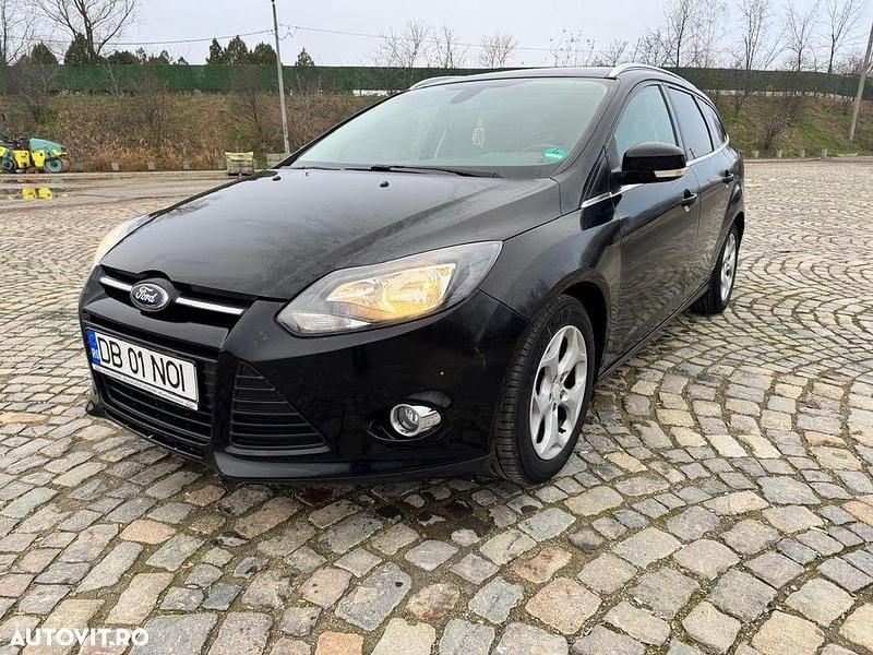 Culoarenegru Utilizat 2012 Ford Focus Titanium Break | 3.789 EUR (Puțin scump) - Imagine 1/4