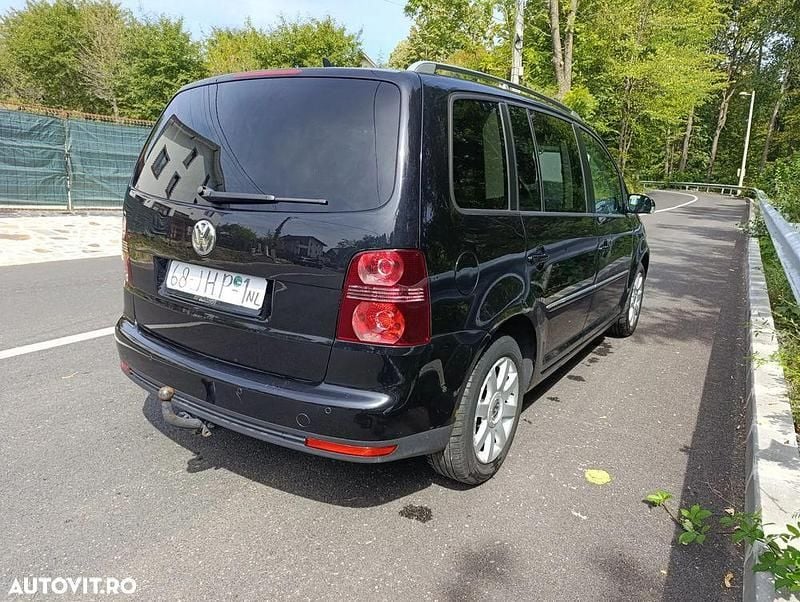 Second-hand VW Touran Highline 140 CP (102 kW) 2009 Culoarenegru Monovolum