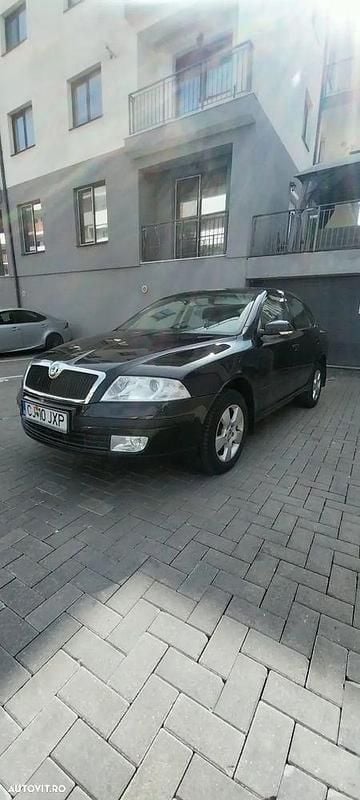 Culoarenegru Utilizat 2007 Skoda Octavia Classic Berlinǎ | 3.990 EUR (Puțin scump) - Imagine 1/4