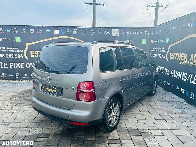 Second-hand VW Touran 105 CP (77 kW) 2009 Culoaregri Monovolum