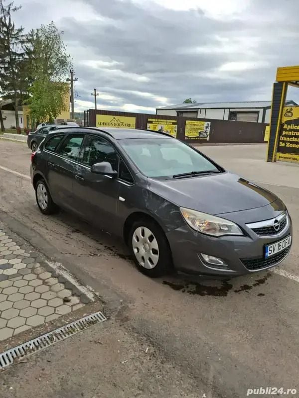 Gri Utilizat 2012 Opel Astra Berlinǎ | 2.700 EUR (Preț bun) - Imagine 1/4