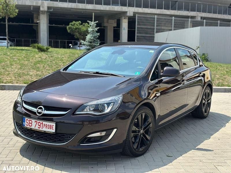Rosu Utilizat 2014 Opel Astra Color Edition Hatchback | 6.900 EUR (Preț OK) - Imagine 1/4