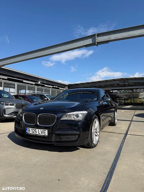 Culoarenegru Utilizat 2010 BMW 740 Comfort Edition Berlinǎ | 9.380 EUR - Imagine 1/4