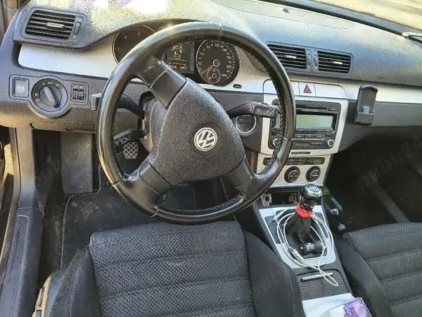 Second-hand VW Passat 103 CP (75 kW) 2009 Negru Berlinǎ