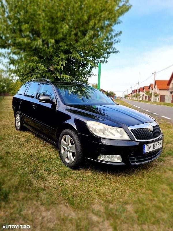 Culoarenegru Utilizat 2009 Skoda Octavia Ambiente Break | 3.500 EUR (Preț OK) - Imagine 1/4