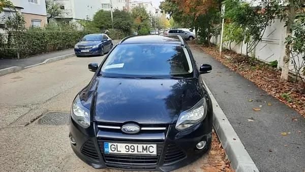 Culoarenegru Utilizat 2011 Ford Focus Titanium Break | 4.300 EUR (Preț OK) - Imagine 1/4