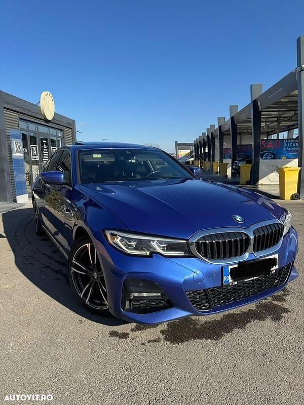 Culoarealbastru Utilizat 2020 BMW 320 M Sport Berlinǎ | 29.900 EUR (Preț bun) - Imagine 1/4