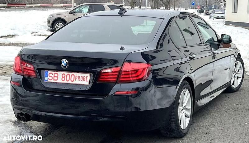 Second-hand BMW 520 184 CP (135 kW) 2014 Culoarealbastru Berlinǎ