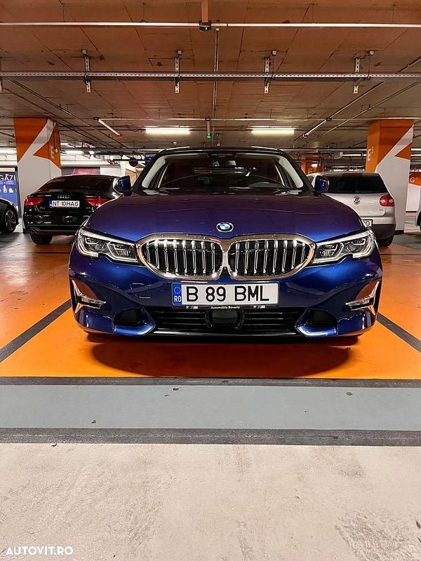 Culoarealbastru Utilizat 2020 BMW 330e Comfort Edition Berlinǎ | 32.900 EUR (Preț bun) - Imagine 1/4
