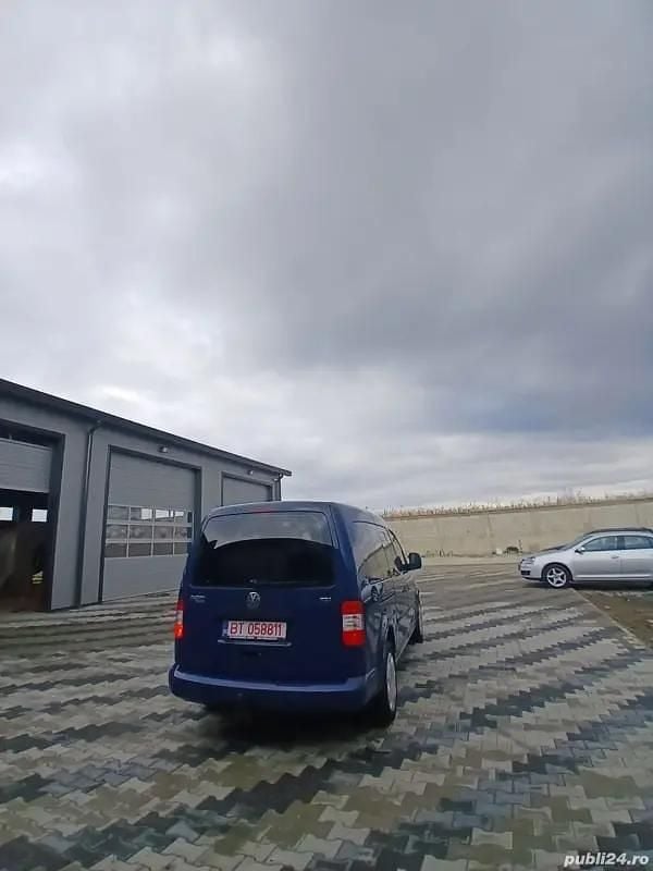 Second-hand VW Caddy 77 CP (56 kW) 2009 Albastru Monovolum