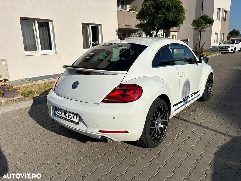Second-hand VW Beetle Exclusive 200 CP (147 kW) 2011 Culoarealb Hatchback