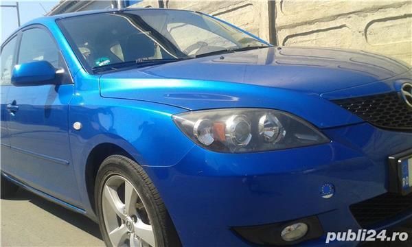 Second-hand Mazda 3 105 CP (77 kW) 2006 Albastru marin Berlinǎ