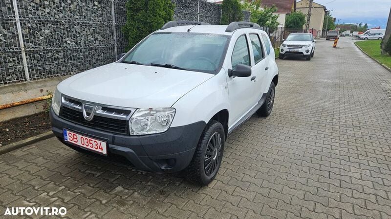 Alb Utilizat 2013 Dacia Duster Lauréate SUV | 5.650 EUR (Preț bun) - Imagine 1/4