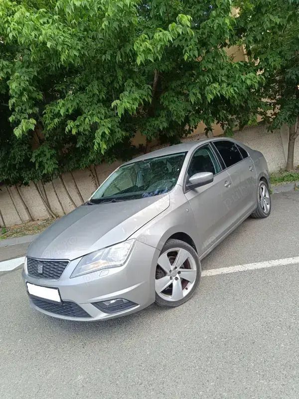 Utilizat 2014 Seat Toledo Style Berlinǎ | 6.799 EUR - Imagine 1/4
