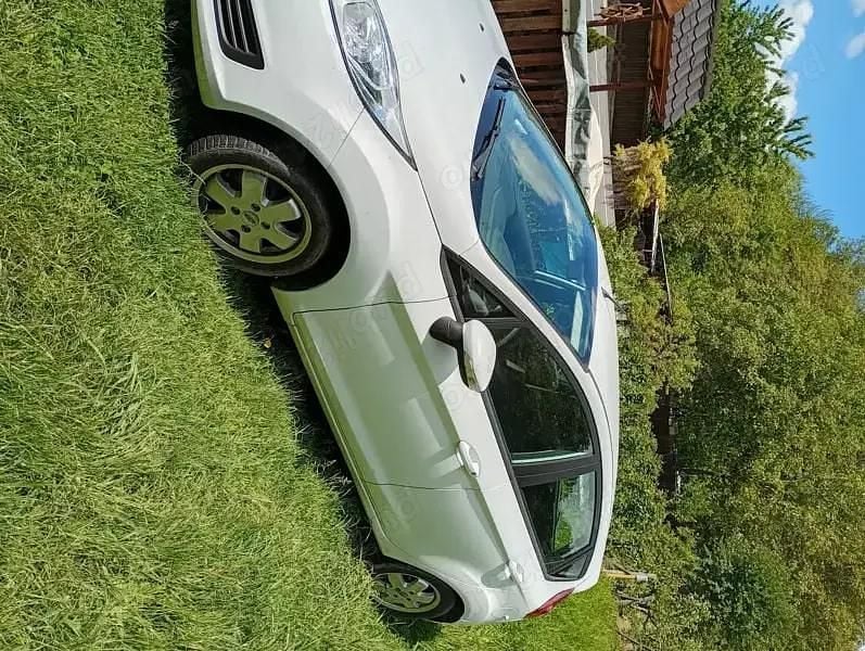 Second-hand Ford Fiesta 75 CP (55 kW) 2014 Alb Hatchback